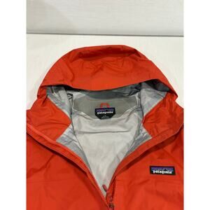 Women's dark orange Patagonia H2NO Torrentshell rain jacket coat
